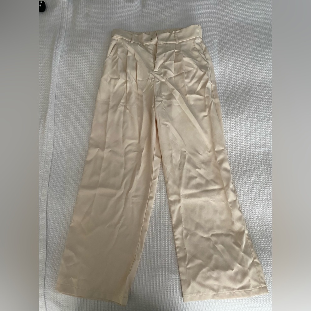 Beige wide legged pants